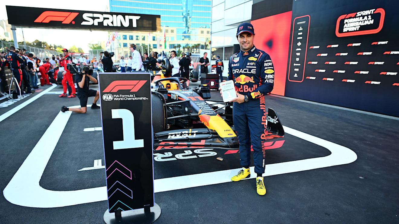 BAKU, AZERBAIJAN - APRIL 29: Sprint winner Sergio Perez of Mexico and Oracle Red Bull Racing celebrates in parc ferme  during the Sprint ahead of the F1 Grand Prix of Azerbaijan at Baku City Circuit on April 29, 2023 in Baku, Azerbaijan. (Photo by Dan Mullan - Formula 1/Formula 1 via Getty Images)