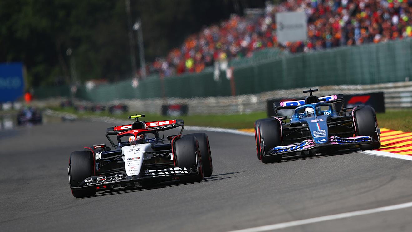 SPA, BELGIUM - JULY 30: Daniel Ricciardo of Australia driving the (3) Scuderia AlphaTauri AT04 leads Esteban Ocon of France driving the (31) Alpine F1 A523 Renault on track during the F1 Grand Prix of Belgium at Circuit de Spa-Francorchamps on July 30, 2023 in Spa, Belgium. (Photo by Joe Portlock - Formula 1/Formula 1 via Getty Images)