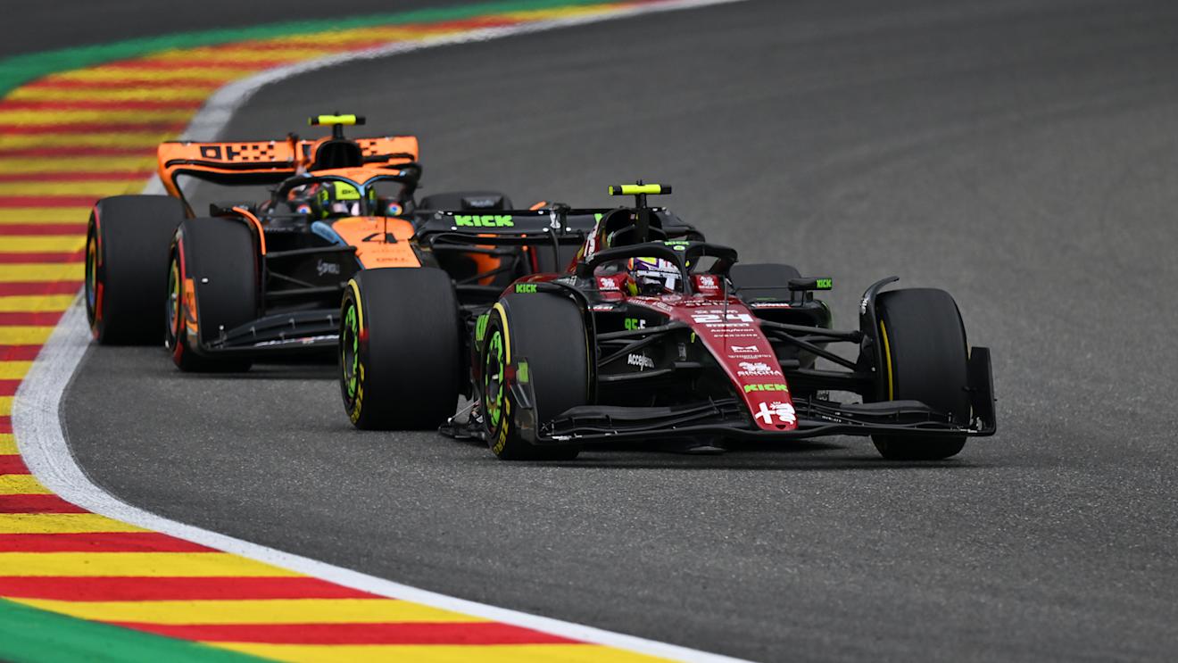 SPA, BELGIUM - JULY 30: Zhou Guanyu of China driving the (24) Alfa Romeo F1 C43 Ferrari leads Lando Norris of Great Britain driving the (4) McLaren MCL60 Mercedes on track during the F1 Grand Prix of Belgium at Circuit de Spa-Francorchamps on July 30, 2023 in Spa, Belgium. (Photo by Dan Mullan/Getty Images)