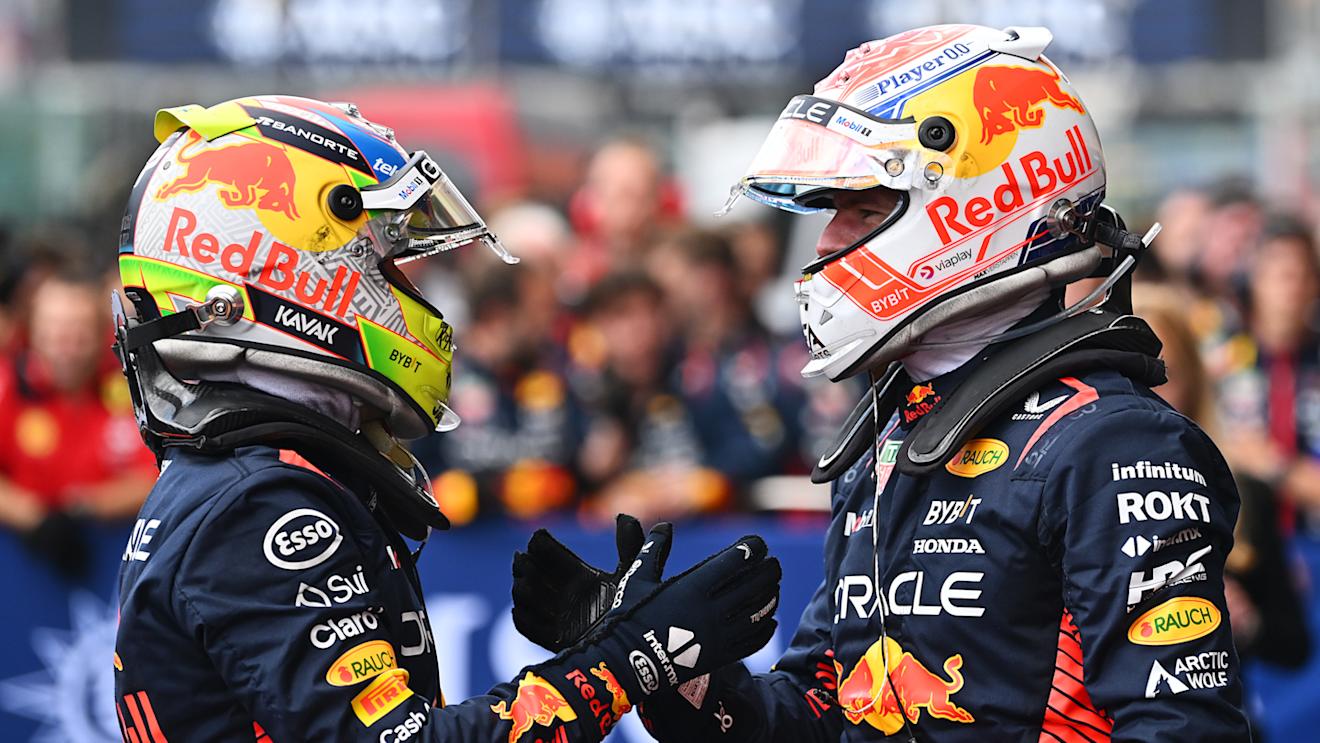 SPA, BELGIUM - JULY 30: Race winner Max Verstappen of the Netherlands and Oracle Red Bull Racing and Second placed Sergio Perez of Mexico and Oracle Red Bull Racing talk in parc ferme during the F1 Grand Prix of Belgium at Circuit de Spa-Francorchamps on July 30, 2023 in Spa, Belgium. (Photo by Dan Mullan/Getty Images)