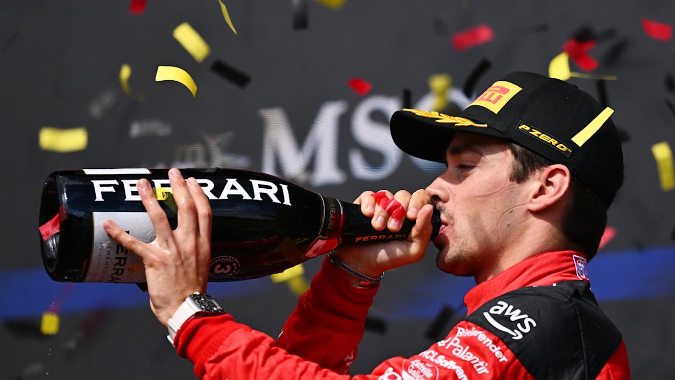 SPA, BELGIUM - JULY 30: Third placed Charles Leclerc of Monaco and Ferrari celebrates on the podium during the F1 Grand Prix of Belgium at Circuit de Spa-Francorchamps on July 30, 2023 in Spa, Belgium. (Photo by Dan Mullan/Getty Images)