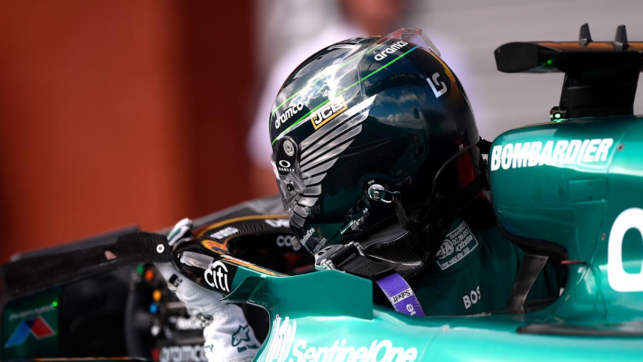 SPA, BELGIUM - JULY 28: 10th placed qualifier Lance Stroll of Canada and Aston Martin F1 Team climbs from his car in parc ferme during qualifying ahead of the F1 Grand Prix of Belgium at Circuit de Spa-Francorchamps on July 28, 2023 in Spa, Belgium. (Photo by Rudy Carezzevoli - Formula 1/Formula 1 via Getty Images)