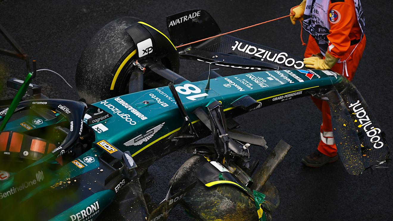 SPA, BELGIUM - JULY 29: The car of Lance Stroll of Canada and Aston Martin F1 Team is removed from the track after a crash during the Sprint Shootout ahead of the F1 Grand Prix of Belgium at Circuit de Spa-Francorchamps on July 29, 2023 in Spa, Belgium. (Photo by Dan Mullan/Getty Images)