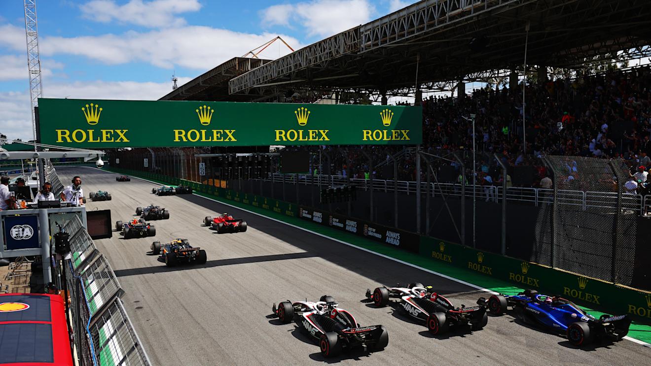 SAO PAULO, BRAZIL - NOVEMBER 05: Kevin Magnussen of Denmark driving the (20) Haas F1 VF-23 Ferrari, Nico Hulkenberg of Germany driving the (27) Haas F1 VF-23 Ferrari and Alexander Albon of Thailand driving the (23) Williams FW45 Mercedes battle for track position into turn one at the start during the F1 Grand Prix of Brazil at Autodromo Jose Carlos Pace on November 05, 2023 in Sao Paulo, Brazil. (Photo by Dan Istitene - Formula 1/Formula 1 via Getty Images)