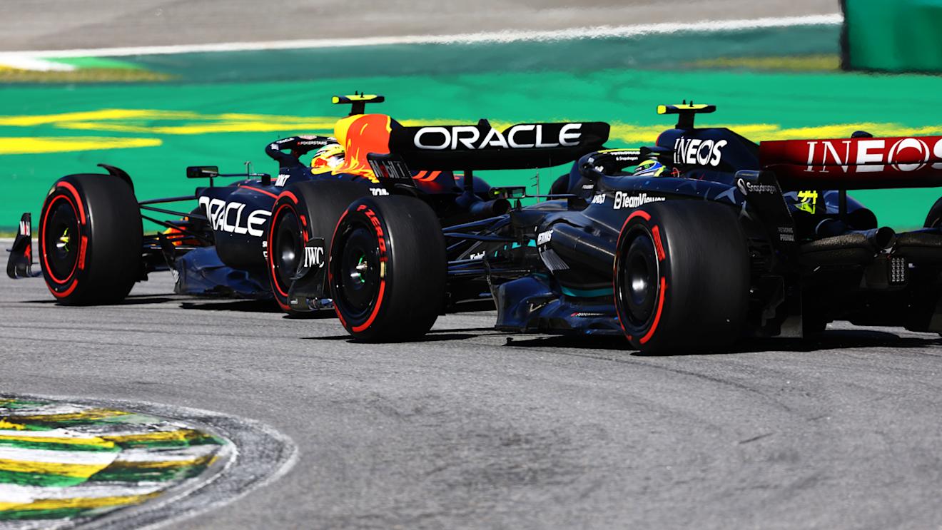 SAO PAULO, BRAZIL - NOVEMBER 05: Lewis Hamilton of Great Britain driving the (44) Mercedes AMG Petronas F1 Team W14 chases Sergio Perez of Mexico driving the (11) Oracle Red Bull Racing RB19 on track during the F1 Grand Prix of Brazil at Autodromo Jose Carlos Pace on November 05, 2023 in Sao Paulo, Brazil. (Photo by Mark Thompson/Getty Images)