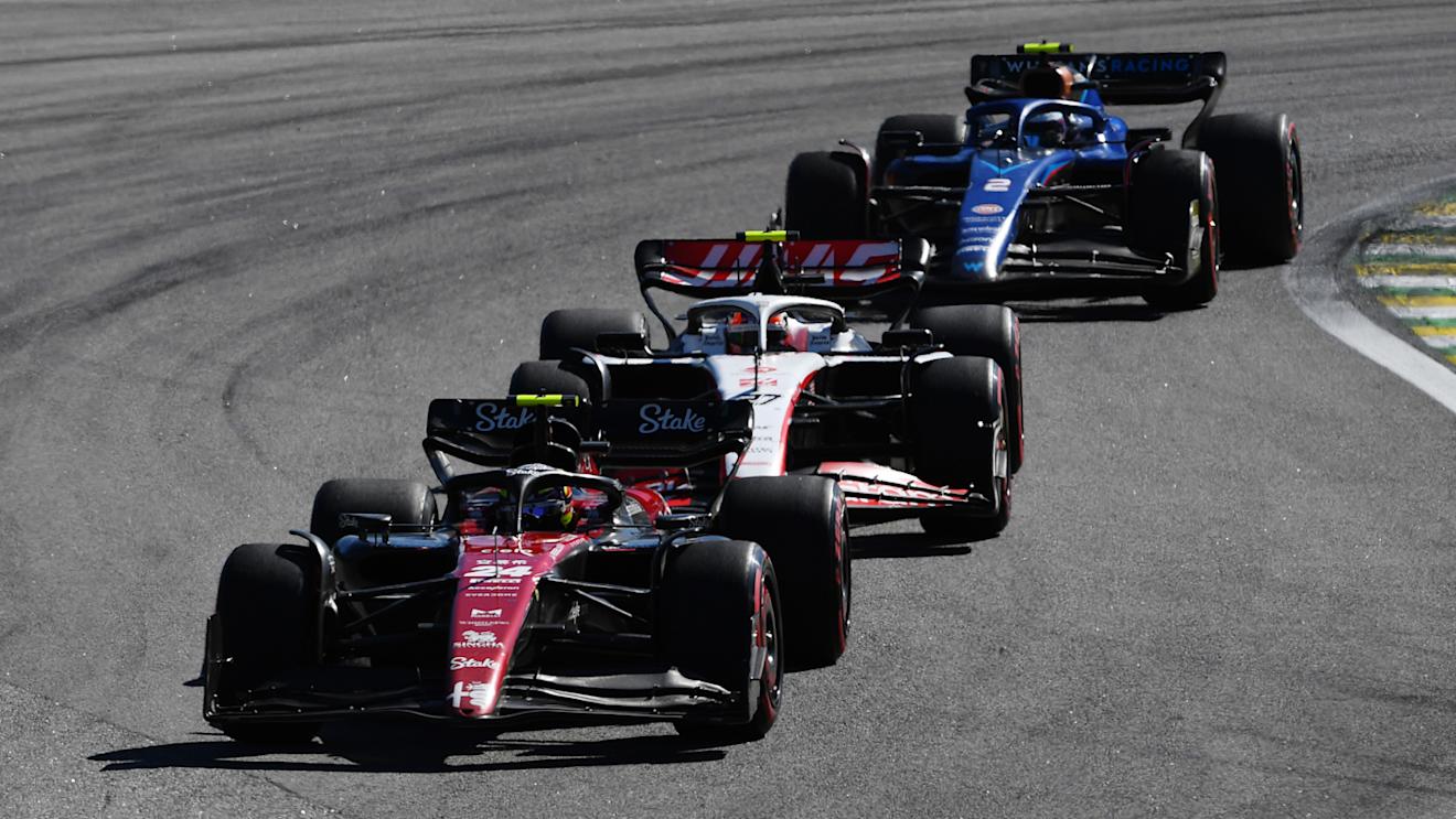 SAO PAULO, BRAZIL - NOVEMBER 05: Zhou Guanyu of China driving the (24) Alfa Romeo F1 C43 Ferrari leads Nico Hulkenberg of Germany driving the (27) Haas F1 VF-23 Ferrari and Logan Sargeant of United States driving the (2) Williams FW45 Mercedes  during the F1 Grand Prix of Brazil at Autodromo Jose Carlos Pace on November 05, 2023 in Sao Paulo, Brazil. (Photo by Rudy Carezzevoli/Getty Images)