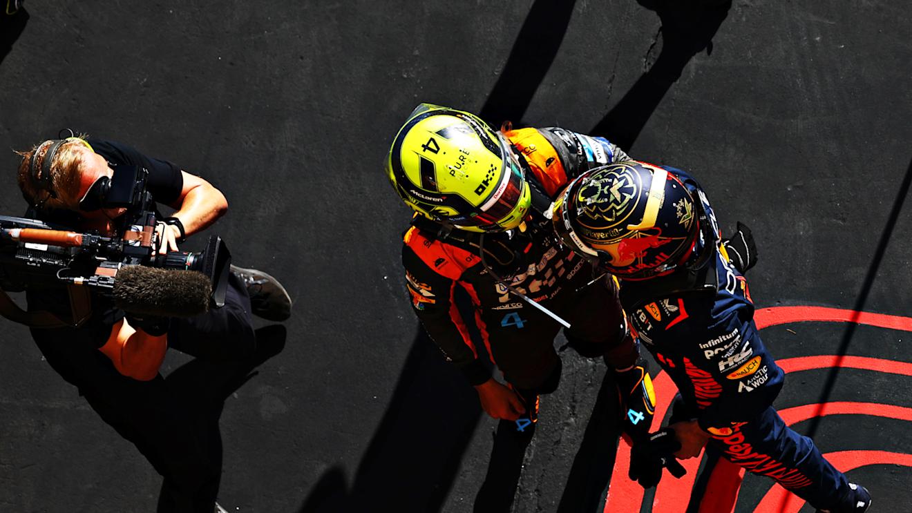SAO PAULO, BRAZIL - NOVEMBER 05: Race winner Max Verstappen of the Netherlands and Oracle Red Bull Racing and Second placed Lando Norris of Great Britain and McLaren talk in parc ferme during the F1 Grand Prix of Brazil at Autodromo Jose Carlos Pace on November 05, 2023 in Sao Paulo, Brazil. (Photo by Mark Thompson/Getty Images)