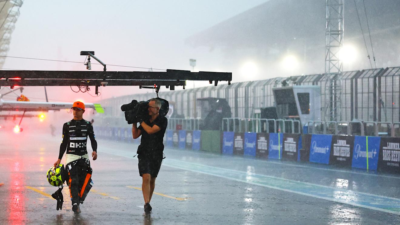 SAO PAULO, BRAZIL - NOVEMBER 03: Seventh placed qualifier Lando Norris of Great Britain and McLaren walks in the Pitlane during qualifying ahead of the F1 Grand Prix of Brazil at Autodromo Jose Carlos Pace on November 03, 2023 in Sao Paulo, Brazil. (Photo by Mark Thompson/Getty Images)