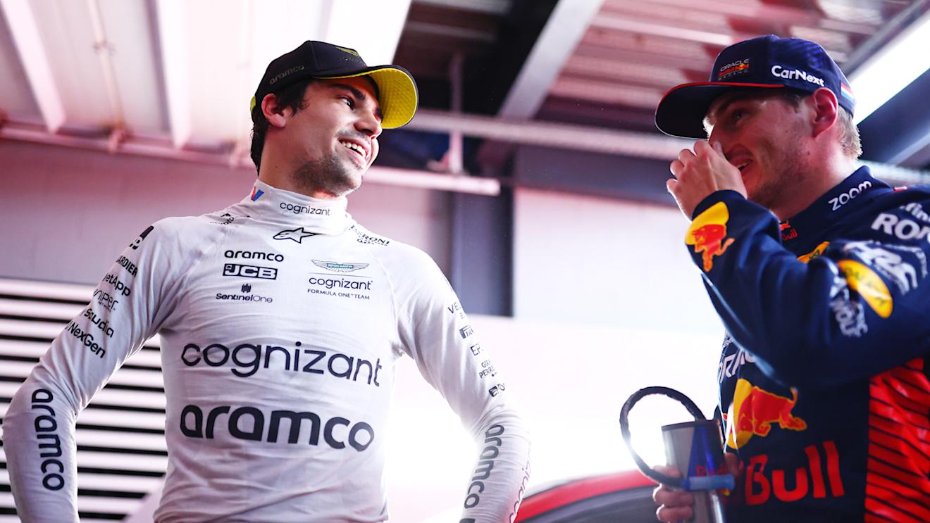 SAO PAULO, BRAZIL - NOVEMBER 03: Pole position qualifier Max Verstappen of the Netherlands and Oracle Red Bull Racing and third placed qualifier Lance Stroll of Canada and Aston Martin F1 Team talk in the FIA Garage after qualifying ahead of the F1 Grand Prix of Brazil at Autodromo Jose Carlos Pace on November 03, 2023 in Sao Paulo, Brazil. (Photo by Dan Istitene - Formula 1/Formula 1 via Getty Images)
