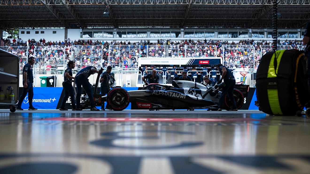 SAO PAULO, BRAZIL - NOVEMBER 03: Daniel Ricciardo of Australia and Scuderia AlphaTauri is pushed back into the garage during qualifying ahead of the F1 Grand Prix of Brazil at Autodromo Jose Carlos Pace on November 03, 2023 in Sao Paulo, Brazil. (Photo by Rudy Carezzevoli/Getty Images)