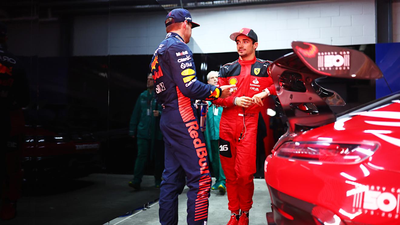 SAO PAULO, BRAZIL - NOVEMBER 03: Second placed qualifier Charles Leclerc of Monaco and Ferrari talks with Pole position qualifier Max Verstappen of the Netherlands and Oracle Red Bull Racing in the FIA Garage after qualifying ahead of the F1 Grand Prix of Brazil at Autodromo Jose Carlos Pace on November 03, 2023 in Sao Paulo, Brazil. (Photo by Dan Istitene - Formula 1/Formula 1 via Getty Images)