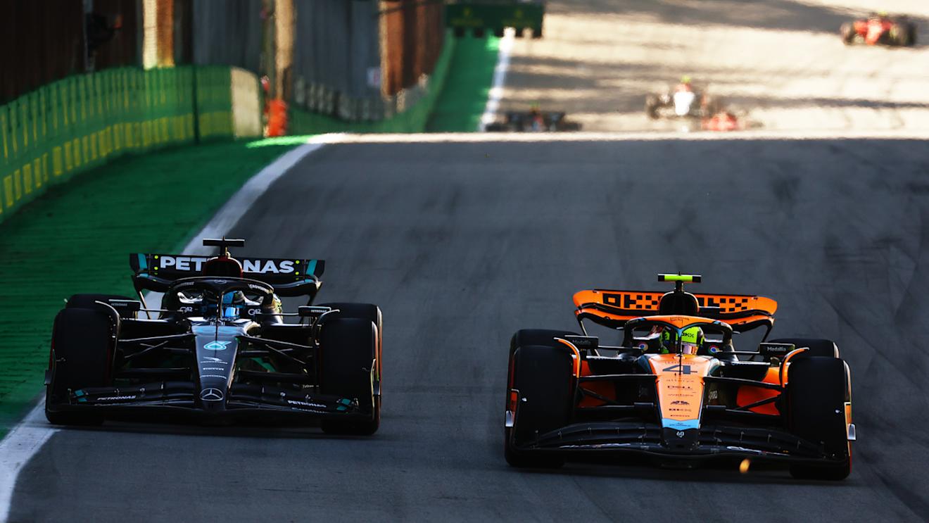 SAO PAULO, BRAZIL - NOVEMBER 04: Lando Norris of Great Britain driving the (4) McLaren MCL60 Mercedes leads George Russell of Great Britain driving the (63) Mercedes AMG Petronas F1 Team W14 on track during the Sprint ahead of the F1 Grand Prix of Brazil at Autodromo Jose Carlos Pace on November 04, 2023 in Sao Paulo, Brazil. (Photo by Mark Thompson/Getty Images)