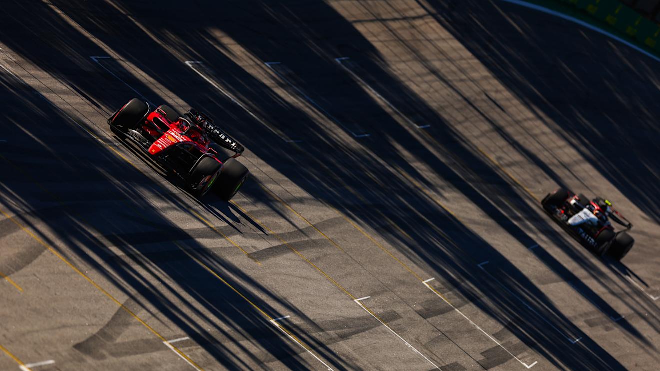 SAO PAULO, BRAZIL - NOVEMBER 04: Charles Leclerc of Monaco driving the (16) Ferrari SF-23 leads Yuki Tsunoda of Japan driving the (22) Scuderia AlphaTauri AT04 on track during the Sprint ahead of the F1 Grand Prix of Brazil at Autodromo Jose Carlos Pace on November 04, 2023 in Sao Paulo, Brazil. (Photo by Dan Istitene - Formula 1/Formula 1 via Getty Images)