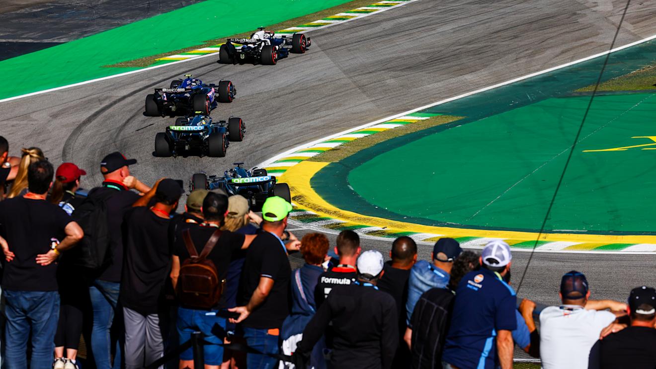 SAO PAULO, BRAZIL - NOVEMBER 04: Daniel Ricciardo of Australia driving the (3) Scuderia AlphaTauri AT04 leads Pierre Gasly of France driving the (10) Alpine F1 A523 Renault and Fernando Alonso of Spain driving the (14) Aston Martin AMR23 Mercedes on track during the Sprint ahead of the F1 Grand Prix of Brazil at Autodromo Jose Carlos Pace on November 04, 2023 in Sao Paulo, Brazil. (Photo by Mark Thompson/Getty Images)