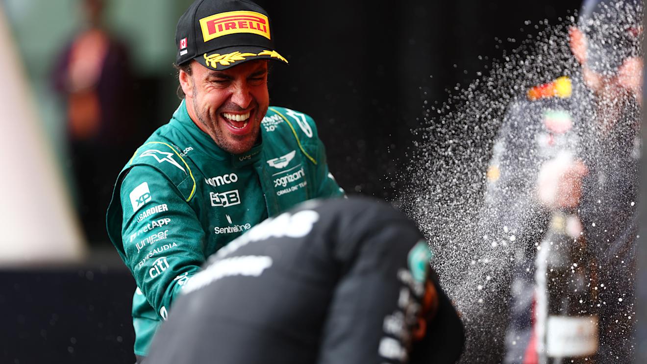 MONTREAL, QUEBEC - JUNE 18: Second placed Fernando Alonso of Spain and Aston Martin F1 Team celebrates on the podium during the F1 Grand Prix of Canada at Circuit Gilles Villeneuve on June 18, 2023 in Montreal, Quebec. (Photo by Dan Istitene - Formula 1/Formula 1 via Getty Images)