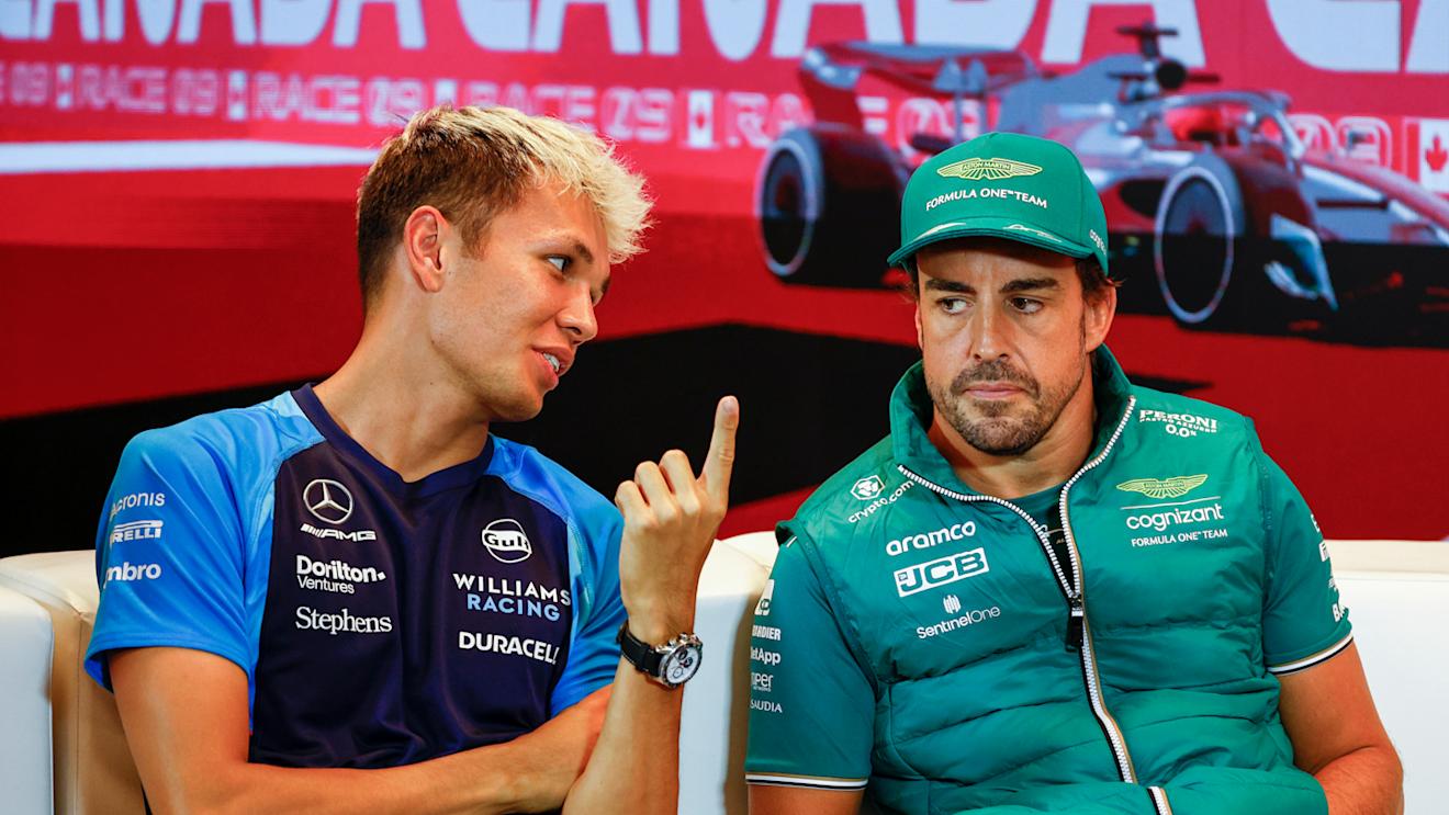 MONTREAL, QUEBEC - JUNE 15: Alexander Albon of Thailand and Williams and Fernando Alonso of Spain and Aston Martin F1 Team talk in the Drivers Press Conference during previews ahead of the F1 Grand Prix of Canada at Circuit Gilles Villeneuve on June 15, 2023 in Montreal, Quebec. (Photo by Jared C. Tilton/Getty Images)