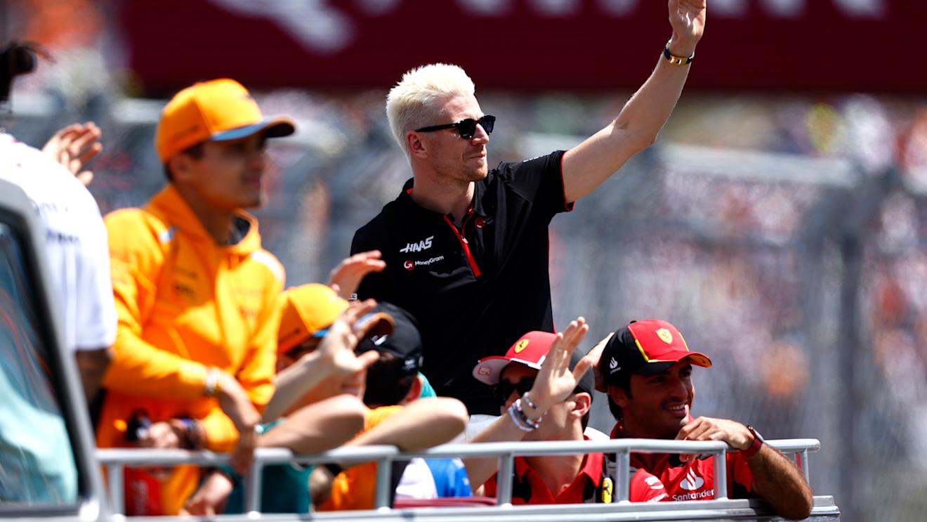 BUDAPEST, HUNGARY - JULY 23: Nico Hulkenberg of Germany and Haas F1 waves to the crowd on the drivers parade prior to the F1 Grand Prix of Hungary at Hungaroring on July 23, 2023 in Budapest, Hungary. (Photo by Francois Nel/Getty Images)