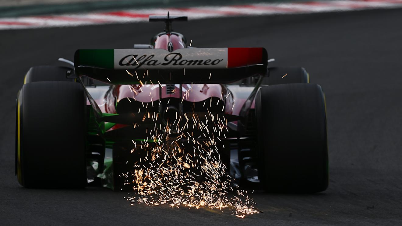 BUDAPEST, HUNGARY - JULY 21: Sparks fly behind Valtteri Bottas of Finland driving the (77) Alfa Romeo F1 C43 Ferrari during practice ahead of the F1 Grand Prix of Hungary at Hungaroring on July 21, 2023 in Budapest, Hungary. (Photo by Dan Mullan/Getty Images)