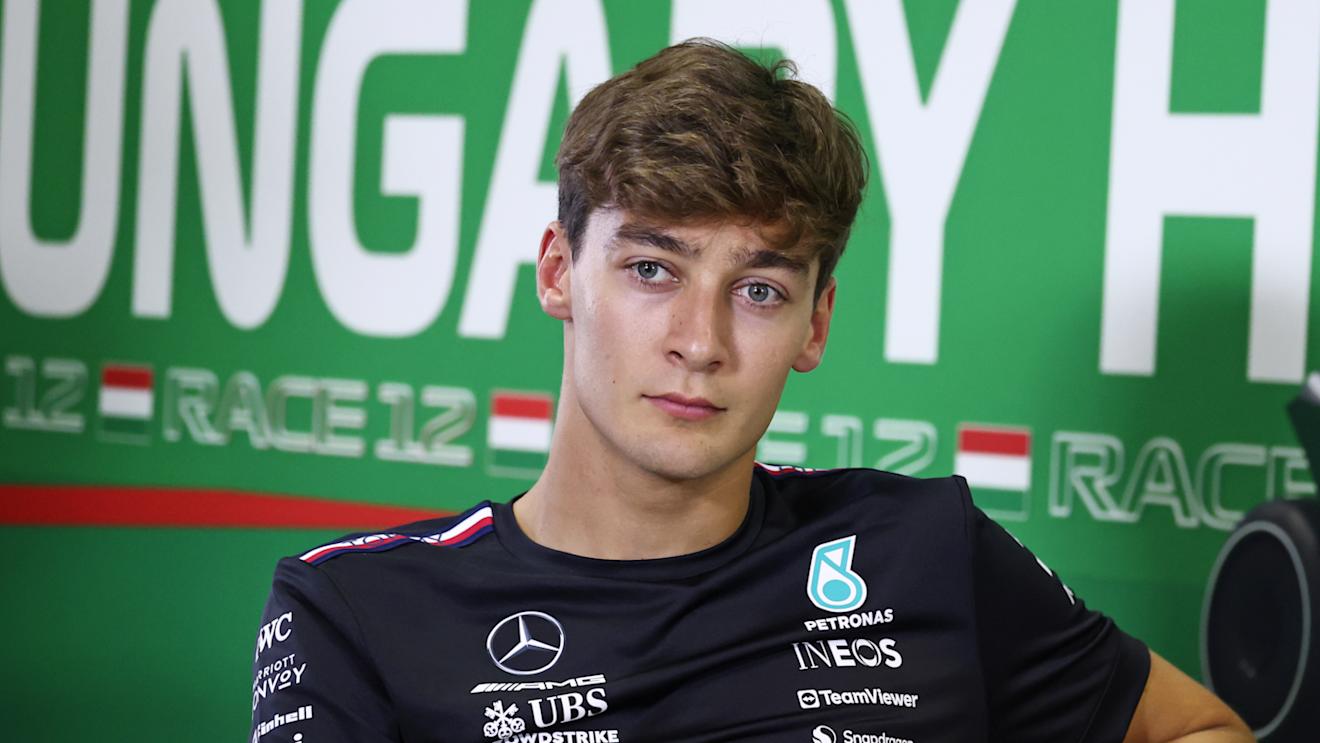 BUDAPEST, HUNGARY - JULY 20: George Russell of Great Britain and Mercedes attends the Drivers Press Conference during previews ahead of the F1 Grand Prix of Hungary at Hungaroring on July 20, 2023 in Budapest, Hungary. (Photo by Bryn Lennon/Getty Images)
