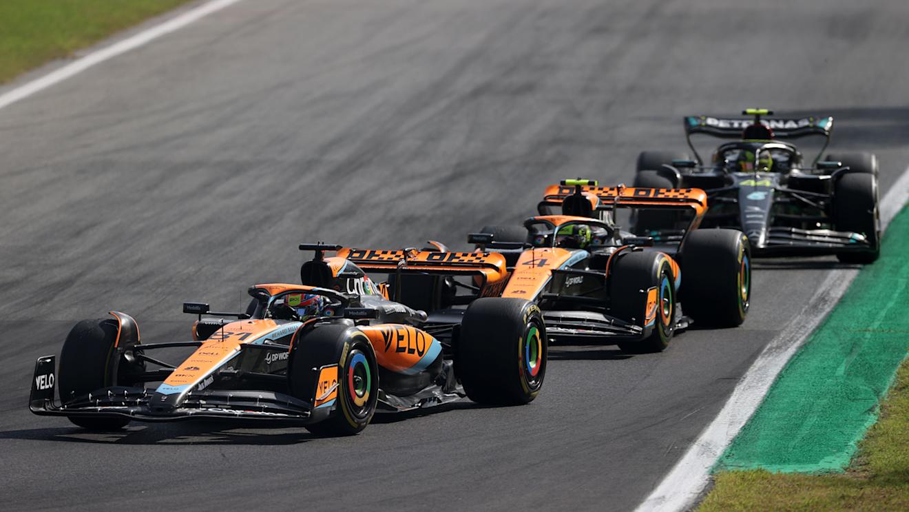MONZA, ITALY - SEPTEMBER 03: Oscar Piastri of Australia driving the (81) McLaren MCL60 Mercedes leads Lando Norris of Great Britain driving the (4) McLaren MCL60 Mercedes during the F1 Grand Prix of Italy at Autodromo Nazionale Monza on September 03, 2023 in Monza, Italy. (Photo by Ryan Pierse/Getty Images)