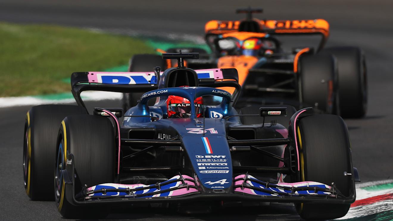 MONZA, ITALY - SEPTEMBER 03: Esteban Ocon of France driving the (31) Alpine F1 A523 Renault leads Oscar Piastri of Australia driving the (81) McLaren MCL60 Mercedes during the F1 Grand Prix of Italy at Autodromo Nazionale Monza on September 03, 2023 in Monza, Italy. (Photo by Peter Fox/Getty Images)