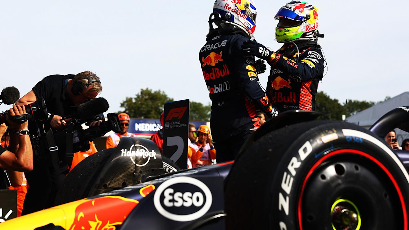 MONZA, ITALY - SEPTEMBER 03: Race winner Max Verstappen of the Netherlands and Oracle Red Bull Racing and Second placed Sergio Perez of Mexico and Oracle Red Bull Racing celebrate in parc ferme during the F1 Grand Prix of Italy at Autodromo Nazionale Monza on September 03, 2023 in Monza, Italy. (Photo by Mark Thompson/Getty Images)