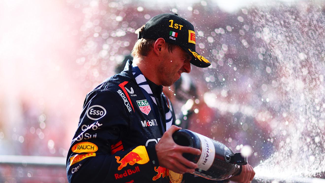 MONZA, ITALY - SEPTEMBER 03: Race winner Max Verstappen of the Netherlands and Oracle Red Bull Racing celebrates on the podium during the F1 Grand Prix of Italy at Autodromo Nazionale Monza on September 03, 2023 in Monza, Italy. (Photo by Dan Istitene - Formula 1/Formula 1 via Getty Images)