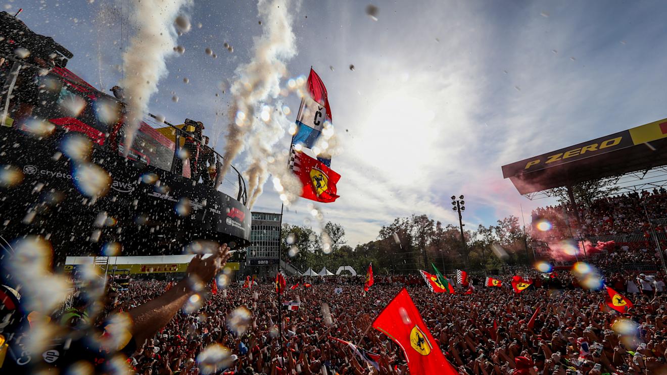 MONZA, ITALY - SEPTEMBER 03: The tifosi celebrate with Max Verstappen of Red Bull Racing and The Netherlands, Sergio Perez of Mexico and Red Bull Racing and Carlos Sainz of Ferrari and Spain during the F1 Grand Prix of Italy at Autodromo Nazionale Monza on September 03, 2023 in Monza, Italy. (Photo by Peter Fox/Getty Images)