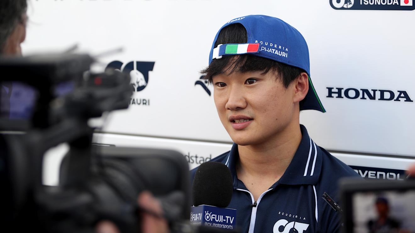 MONZA, ITALY - SEPTEMBER 01: Yuki Tsunoda of Japan and Scuderia AlphaTauri talks to the media in the Paddock after practice ahead of the F1 Grand Prix of Italy at Autodromo Nazionale Monza on September 01, 2023 in Monza, Italy. (Photo by Peter Fox/Getty Images)