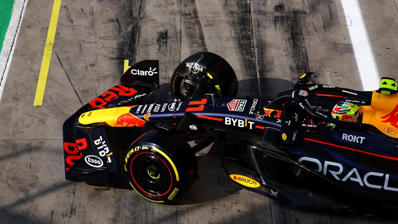 MONZA, ITALY - SEPTEMBER 02: Sergio Perez of Mexico driving the (11) Oracle Red Bull Racing RB19 leaves the garage during qualifying ahead of the F1 Grand Prix of Italy at Autodromo Nazionale Monza on September 02, 2023 in Monza, Italy. (Photo by Mark Thompson/Getty Images)