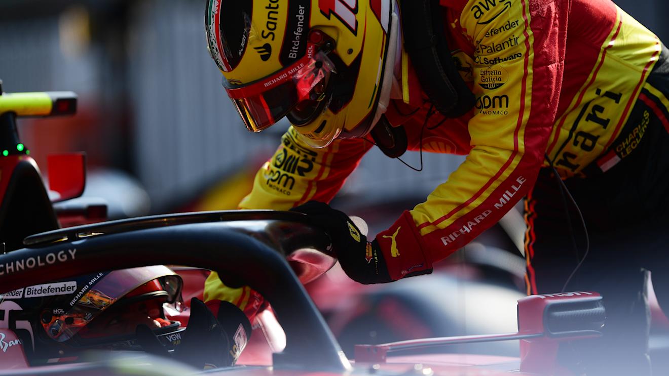 MONZA, ITALY - SEPTEMBER 02: Charles Leclerc of Monaco and Ferrari congratulates pole position qualifier Carlos Sainz of Spain and Ferrari celebrates in parc ferme during qualifying ahead of the F1 Grand Prix of Italy at Autodromo Nazionale Monza on September 02, 2023 in Monza, Italy. (Photo by Mario Renzi - Formula 1/Formula 1 via Getty Images)