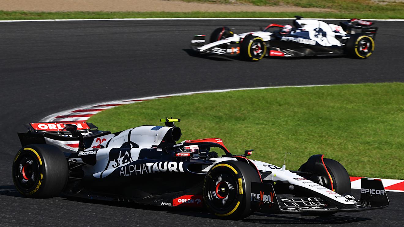 SUZUKA, JAPAN - SEPTEMBER 24: Yuki Tsunoda of Japan driving the (22) Scuderia AlphaTauri AT04 leads Liam Lawson of New Zealand driving the (40) Scuderia AlphaTauri AT04 during the F1 Grand Prix of Japan at Suzuka International Racing Course on September 24, 2023 in Suzuka, Japan. (Photo by Clive Mason/Getty Images)
