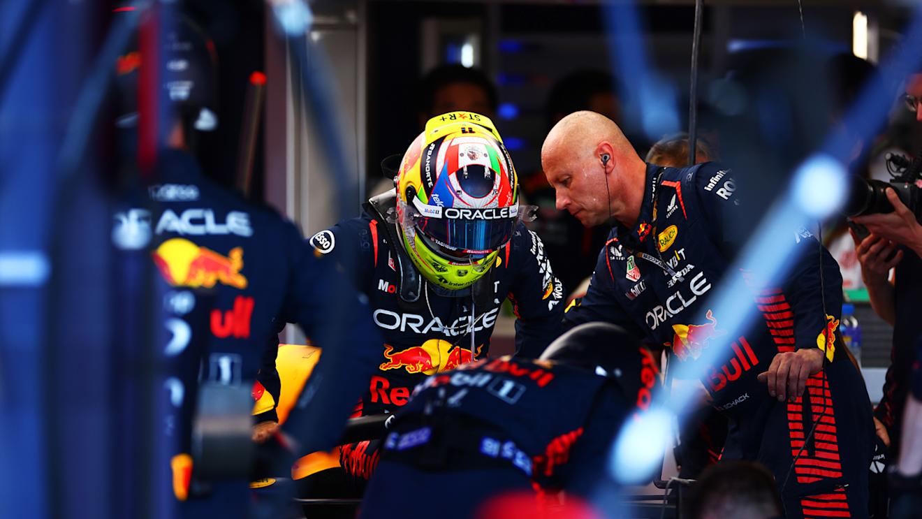 SUZUKA, JAPAN - SEPTEMBER 24: Sergio Perez of Mexico and Oracle Red Bull Racing sits in his car after returning to the garage during the F1 Grand Prix of Japan at Suzuka International Racing Course on September 24, 2023 in Suzuka, Japan. (Photo by Dan Istitene - Formula 1/Formula 1 via Getty Images)
