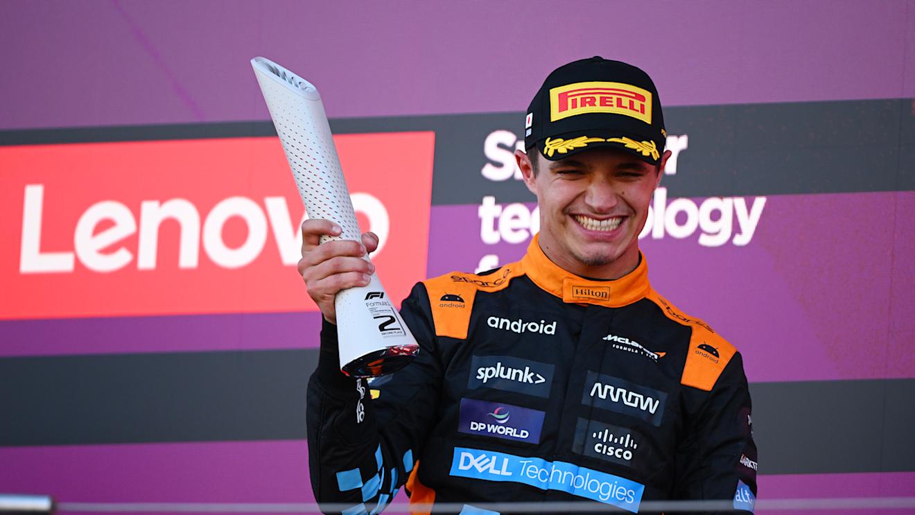 SUZUKA, JAPAN - SEPTEMBER 24: Second placed Lando Norris of Great Britain and McLaren celebrates on the podium during the F1 Grand Prix of Japan at Suzuka International Racing Course on September 24, 2023 in Suzuka, Japan. (Photo by Clive Mason/Getty Images)