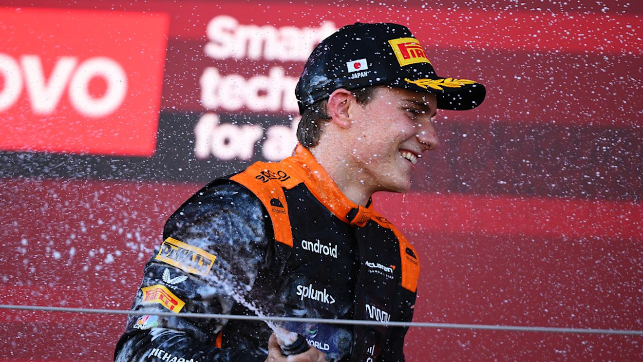 SUZUKA, JAPAN - SEPTEMBER 24: Third placed Oscar Piastri of Australia and McLaren celebrates on the podium during the F1 Grand Prix of Japan at Suzuka International Racing Course on September 24, 2023 in Suzuka, Japan. (Photo by Clive Mason/Getty Images)