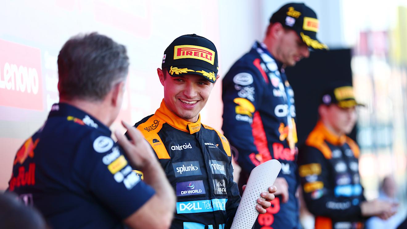 SUZUKA, JAPAN - SEPTEMBER 24: Second placed Lando Norris of Great Britain and McLaren talks with Red Bull Racing Team Principal Christian Horner on the podium during the F1 Grand Prix of Japan at Suzuka International Racing Course on September 24, 2023 in Suzuka, Japan. (Photo by Dan Istitene - Formula 1/Formula 1 via Getty Images)