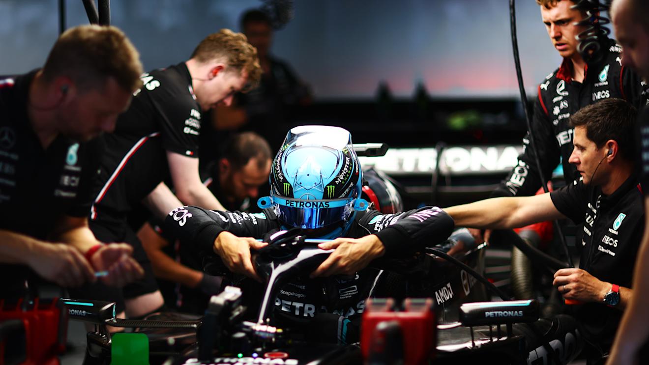 SUZUKA, JAPAN - SEPTEMBER 22: George Russell of Great Britain and Mercedes climbs out of his car in the garage during practice ahead of the F1 Grand Prix of Japan at Suzuka International Racing Course on September 22, 2023 in Suzuka, Japan. (Photo by Dan Istitene - Formula 1/Formula 1 via Getty Images)