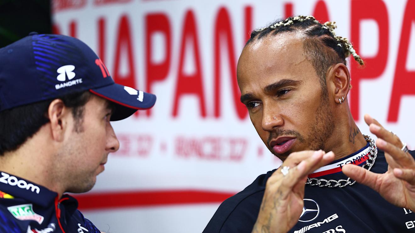 SUZUKA, JAPAN - SEPTEMBER 21: Lewis Hamilton of Great Britain and Mercedes talks with Sergio Perez of Mexico and Oracle Red Bull Racing in the Drivers Press Conference during previews ahead of the F1 Grand Prix of Japan at Suzuka International Racing Course on September 21, 2023 in Suzuka, Japan. (Photo by Clive Rose/Getty Images)
