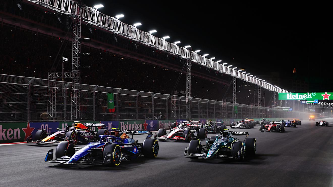 LAS VEGAS, NEVADA - NOVEMBER 18: Logan Sargeant of United States driving the (2) Williams FW45 Mercedes leads Fernando Alonso of Spain driving the (14) Aston Martin AMR23 Mercedes on track during the F1 Grand Prix of Las Vegas at Las Vegas Strip Circuit on November 18, 2023 in Las Vegas, Nevada. (Photo by Dan Istitene - Formula 1/Formula 1 via Getty Images)