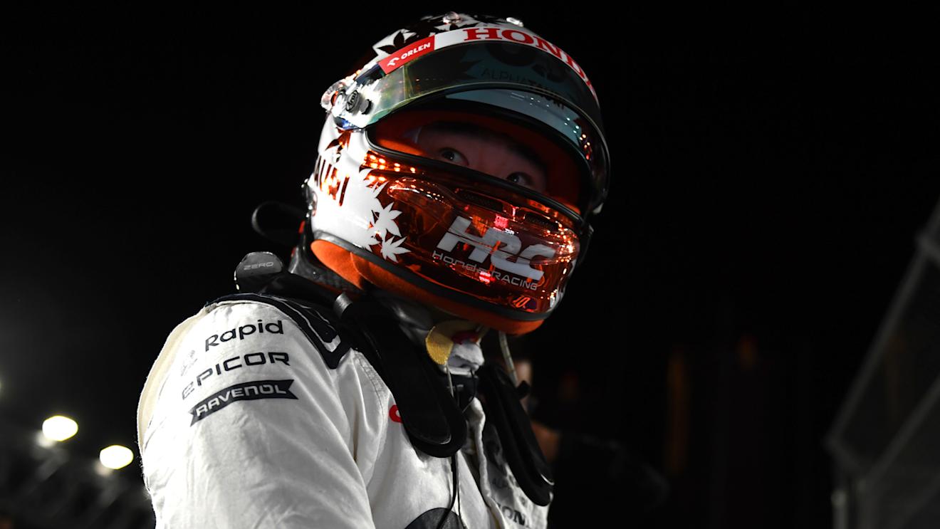 LAS VEGAS, NEVADA - NOVEMBER 18: Yuki Tsunoda of Japan driving the (22) Scuderia AlphaTauri AT04 prepares to drive on the grid prior to the F1 Grand Prix of Las Vegas at Las Vegas Strip Circuit on November 18, 2023 in Las Vegas, Nevada. (Photo by Rudy Carezzevoli/Getty Images)