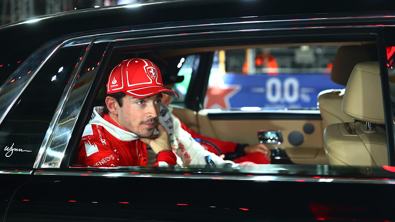 LAS VEGAS, NEVADA - NOVEMBER 18: Second placed Charles Leclerc of Monaco and Ferrari reacts on their way to the podium during the F1 Grand Prix of Las Vegas at Las Vegas Strip Circuit on November 18, 2023 in Las Vegas, Nevada. (Photo by Dan Istitene - Formula 1/Formula 1 via Getty Images)