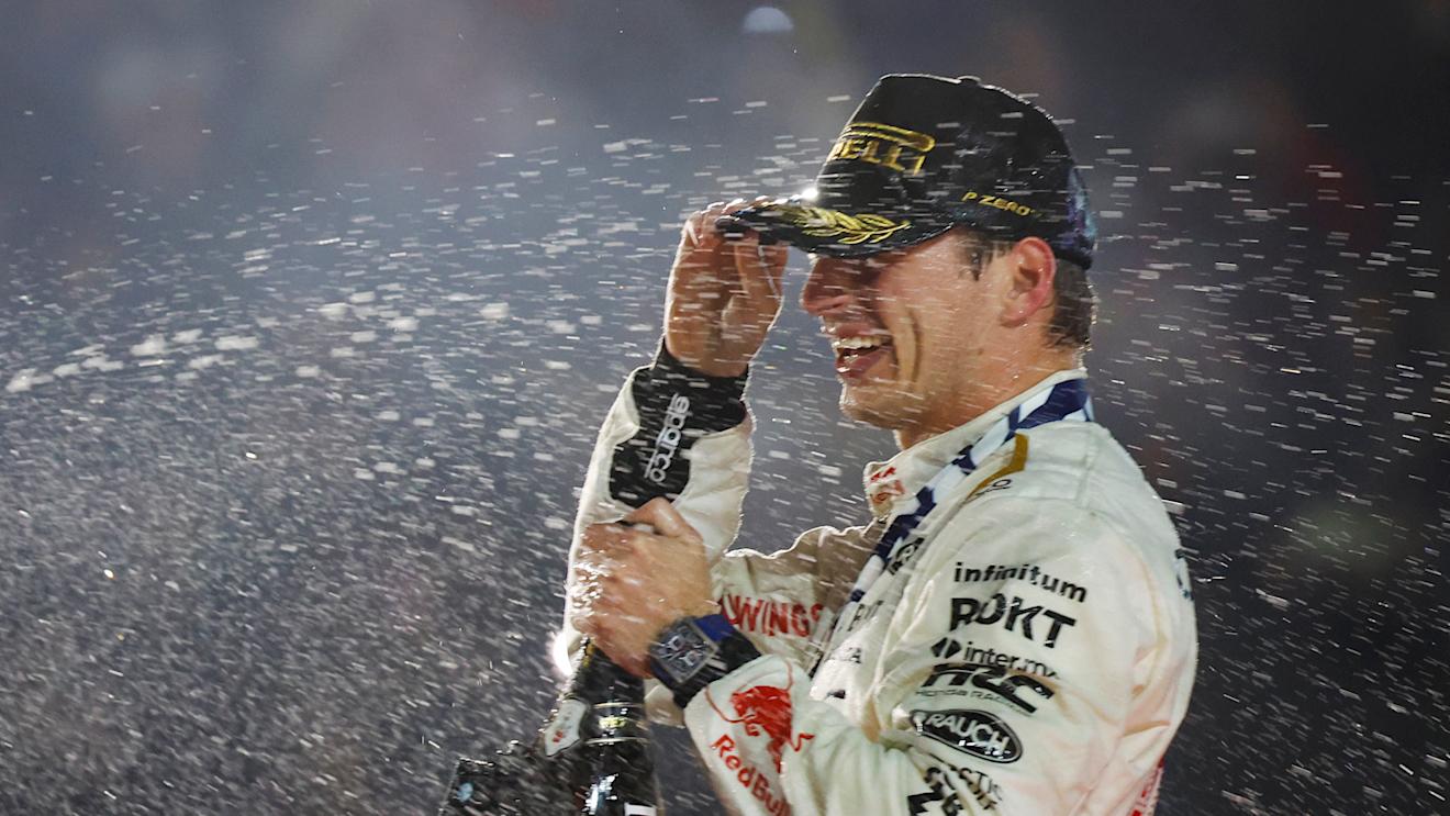 LAS VEGAS, NEVADA - NOVEMBER 18: Race winner Max Verstappen of the Netherlands and Oracle Red Bull Racing celebrates on the podium during the F1 Grand Prix of Las Vegas at Las Vegas Strip Circuit on November 18, 2023 in Las Vegas, Nevada. (Photo by Chris Graythen/Getty Images)