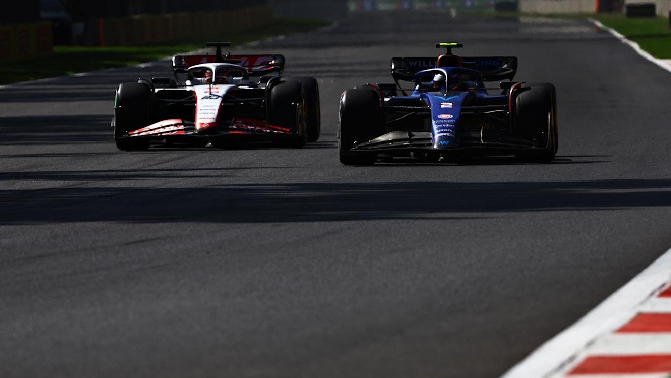 MEXICO CITY, MEXICO - OCTOBER 29: Logan Sargeant of United States driving the (2) Williams FW45 Mercedes leads Kevin Magnussen of Denmark driving the (20) Haas F1 VF-23 Ferrari during the F1 Grand Prix of Mexico at Autodromo Hermanos Rodriguez on October 29, 2023 in Mexico City, Mexico. (Photo by Mark Thompson/Getty Images)