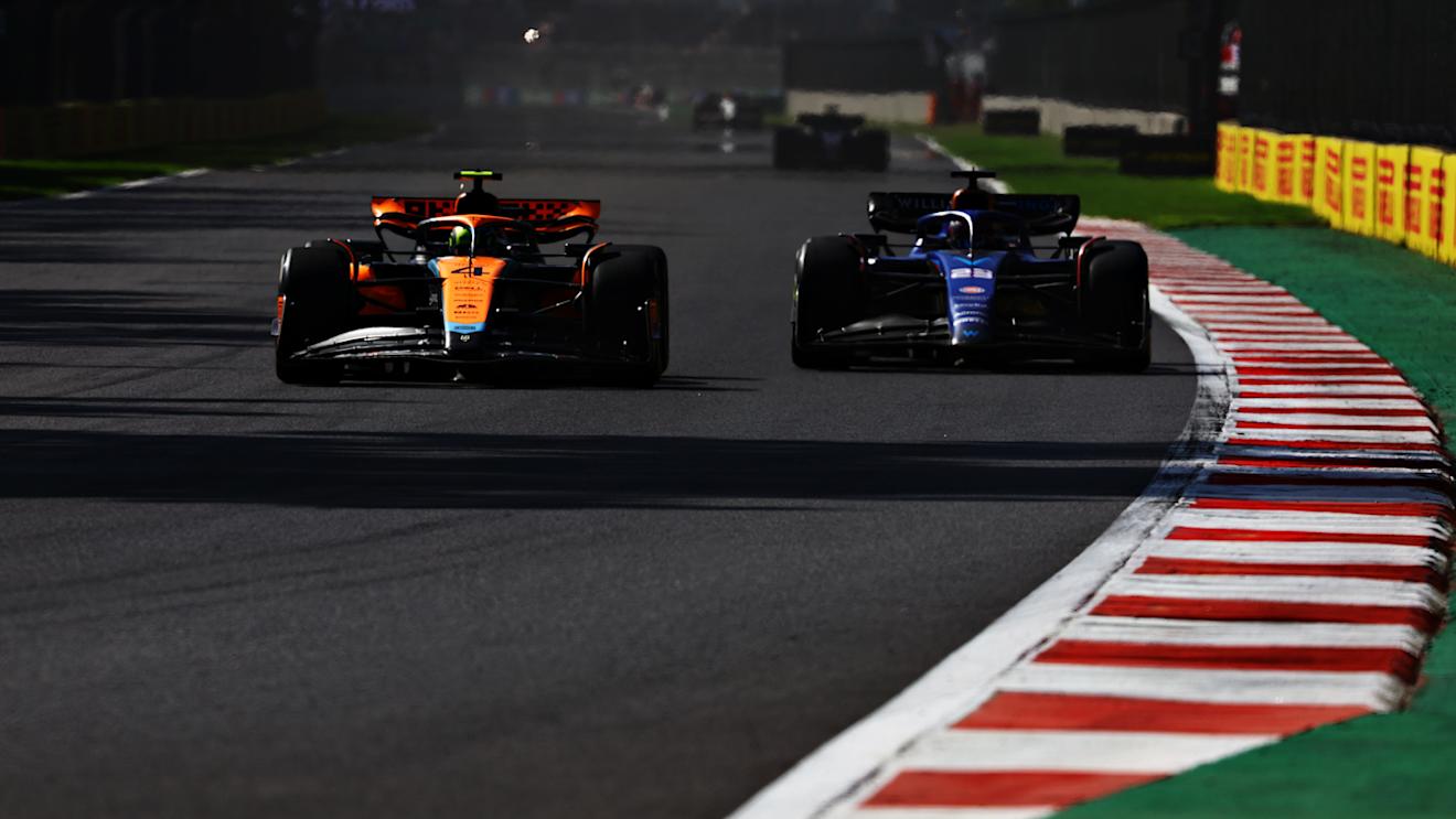 MEXICO CITY, MEXICO - OCTOBER 29: Lando Norris of Great Britain driving the (4) McLaren MCL60 Mercedes leads Alexander Albon of Thailand driving the (23) Williams FW45 Mercedes during the F1 Grand Prix of Mexico at Autodromo Hermanos Rodriguez on October 29, 2023 in Mexico City, Mexico. (Photo by Mark Thompson/Getty Images)