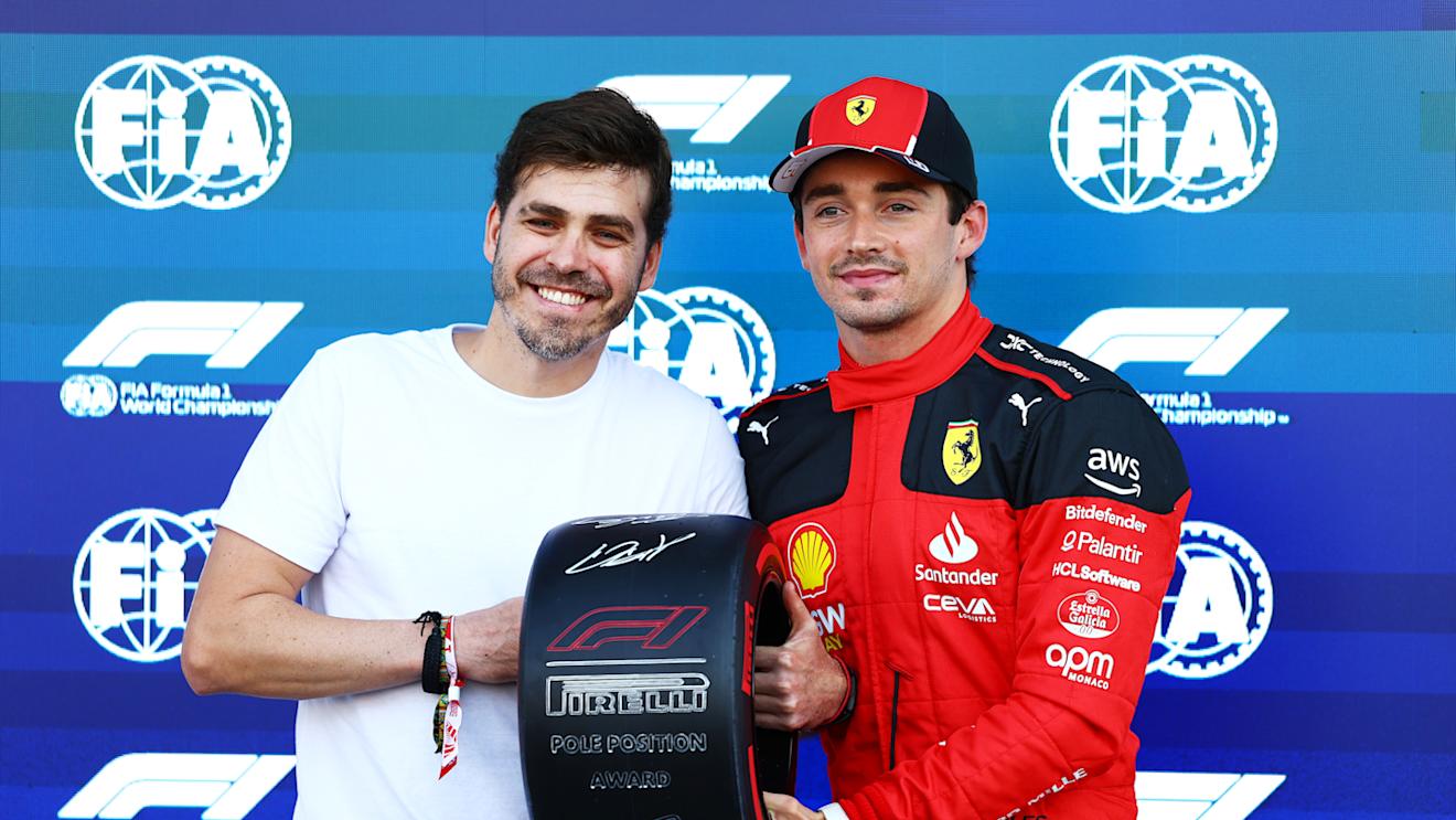 MEXICO CITY, MEXICO - OCTOBER 28: Pole position qualifier Charles Leclerc of Monaco and Ferrari is presented with the Pirelli Pole Position Award. by Jimmy Alvarez in parc ferme during qualifying ahead of the F1 Grand Prix of Mexico at Autodromo Hermanos Rodriguez on October 28, 2023 in Mexico City, Mexico. (Photo by Mark Thompson/Getty Images)