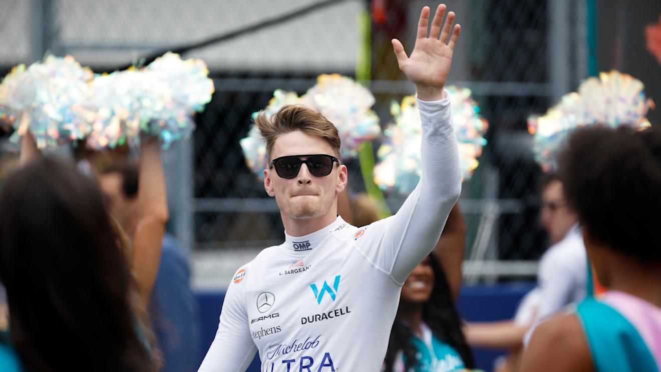 MIAMI, FLORIDA - MAY 07: Logan Sargeant of United States and Williams waves to the crowd from the grid prior to the F1 Grand Prix of Miami at Miami International Autodrome on May 07, 2023 in Miami, Florida. (Photo by Jared C. Tilton/Getty Images)