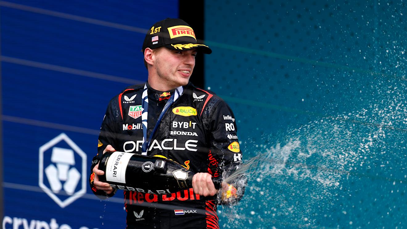 MIAMI, FLORIDA - MAY 07: Race winner Max Verstappen of the Netherlands and Oracle Red Bull Racing celebrates on the podium during the F1 Grand Prix of Miami at Miami International Autodrome on May 07, 2023 in Miami, Florida. (Photo by Chris Graythen/Getty Images)