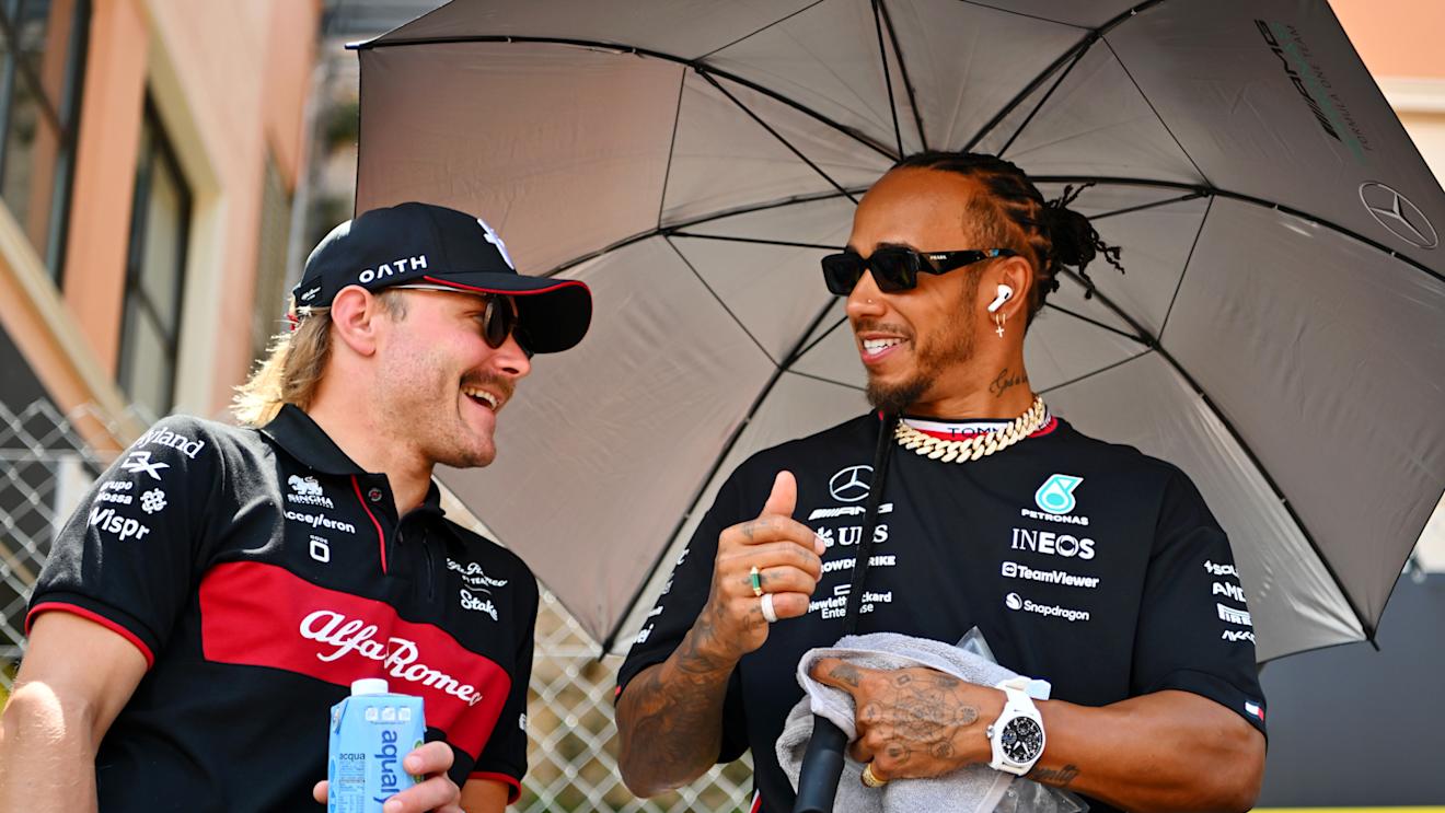 MONTE-CARLO, MONACO - MAY 28: Lewis Hamilton of Great Britain and Mercedes talks with Valtteri Bottas of Finland and Alfa Romeo F1 on the drivers parade prior to the F1 Grand Prix of Monaco at Circuit de Monaco on May 28, 2023 in Monte-Carlo, Monaco. (Photo by Dan Mullan/Getty Images)