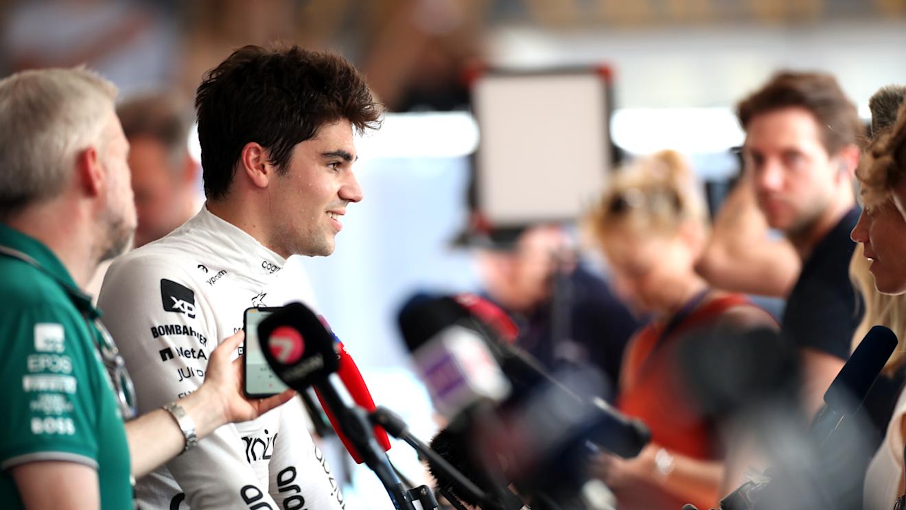 MONTE-CARLO, MONACO - MAY 27: 14th placed qualifier Lance Stroll of Canada and Aston Martin F1 Team talks to the media in the Paddock during qualifying ahead of the F1 Grand Prix of Monaco at Circuit de Monaco on May 27, 2023 in Monte-Carlo, Monaco. (Photo by Peter Fox/Getty Images)