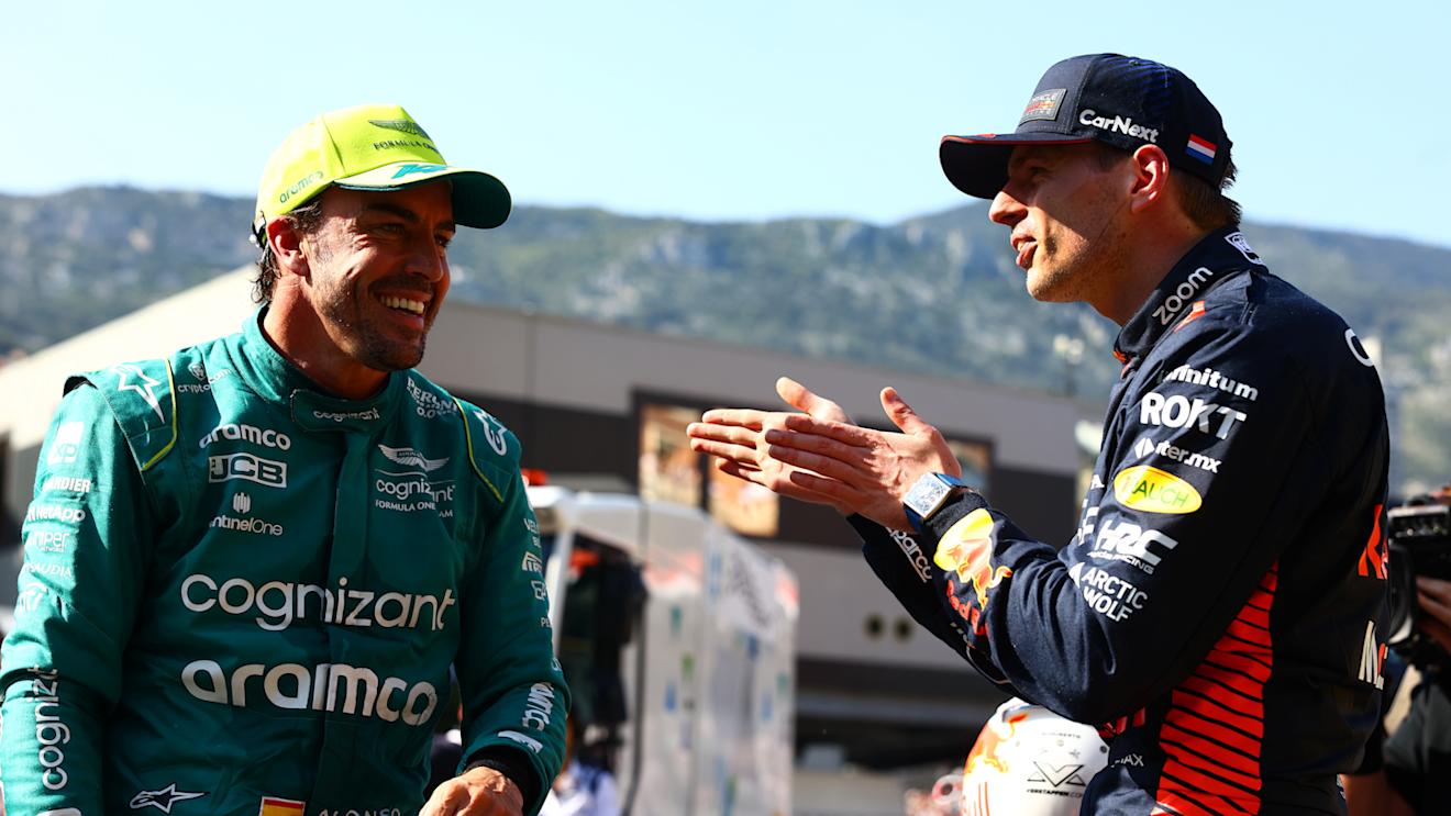 MONTE-CARLO, MONACO - MAY 27: Pole position qualifier Max Verstappen of the Netherlands and Oracle Red Bull Racing and Second placed qualifier Fernando Alonso of Spain and Aston Martin F1 Team talk in parc ferme during qualifying ahead of the F1 Grand Prix of Monaco at Circuit de Monaco on May 27, 2023 in Monte-Carlo, Monaco. (Photo by Mark Thompson/Getty Images)